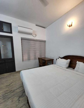SPOT ON 81275 Mannath Homes